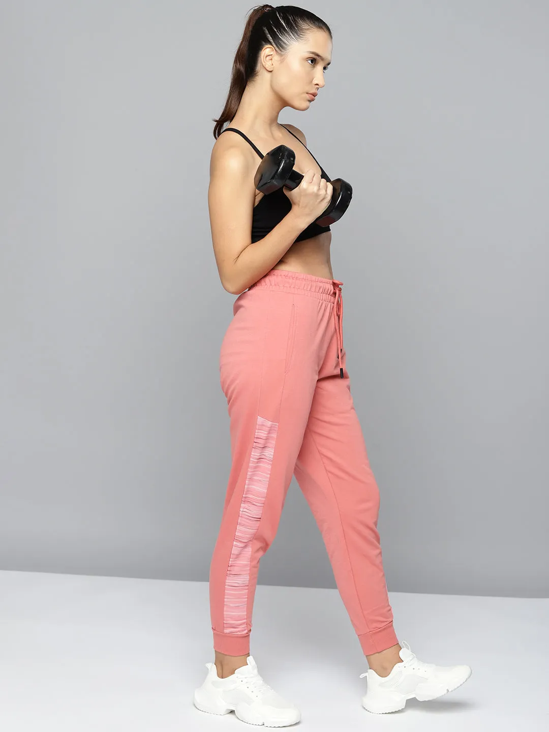 Alcis Women Peach-Coloured Solid Slim-Fit Training Joggers with Side Taping