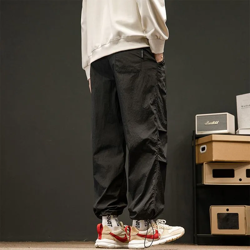 Loose Fit Drawstring Hem Elasticity Tapered Cargo Pants