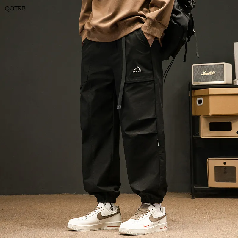 Loose Fit Elasticity Slant Pocket Tapered Cargo Pants