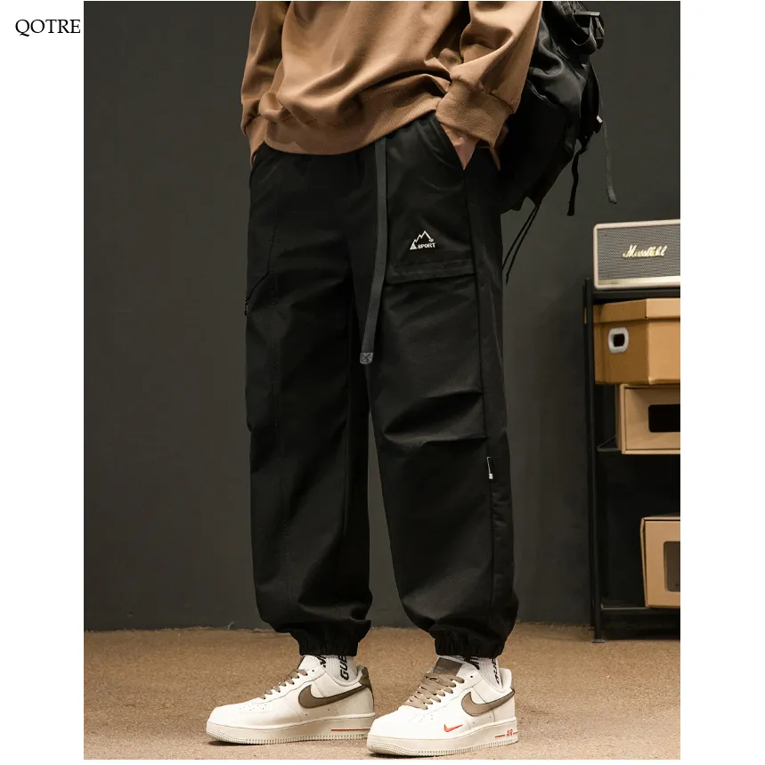 Loose Fit Elasticity Slant Pocket Tapered Cargo Pants