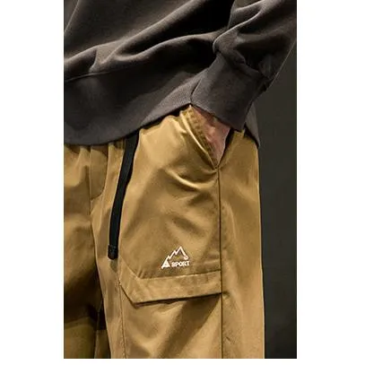 Loose Fit Elasticity Slant Pocket Tapered Cargo Pants