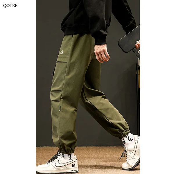 Loose Fit Elasticity Slant Pocket Tapered Cargo Pants