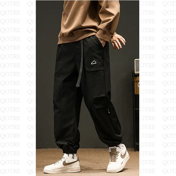 Loose Fit Elasticity Slant Pocket Tapered Cargo Pants