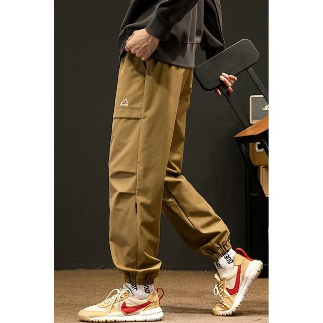 Loose Fit Elasticity Slant Pocket Tapered Cargo Pants