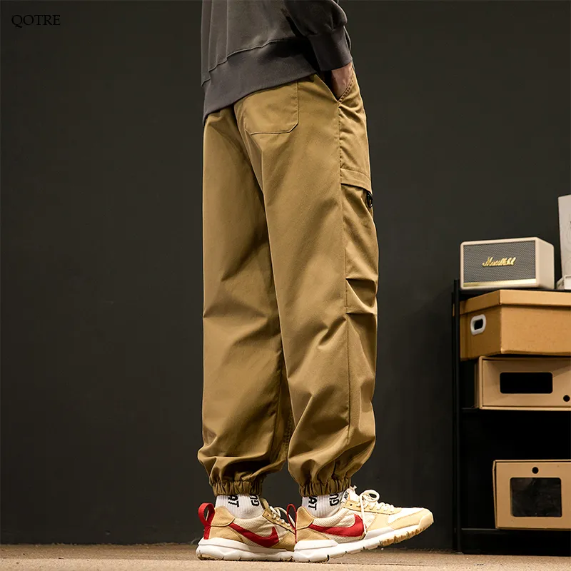 Loose Fit Elasticity Slant Pocket Tapered Cargo Pants